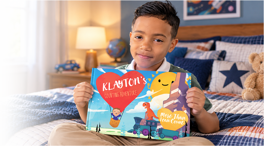 A child holding their personalised book, More Than I Can Count